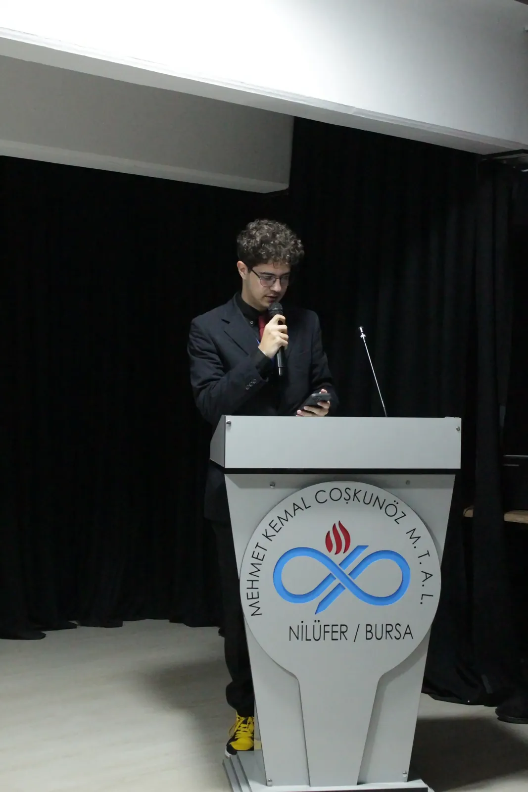 COSMUN — speaker at the podium
